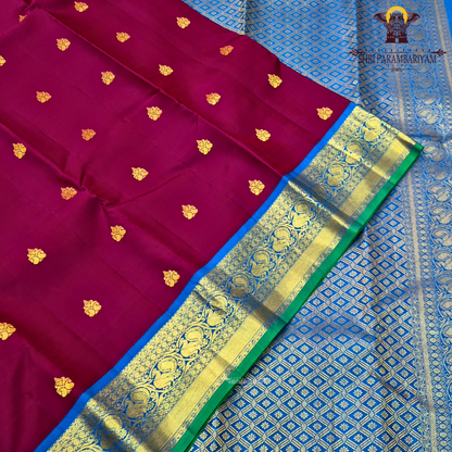 Deep Rani Pink / Maroonish Pink body with Royal Blue border and Green edge Saree