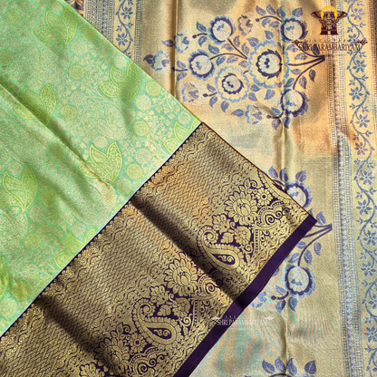 A refreshing parrot green / leaf green Tissue Saree