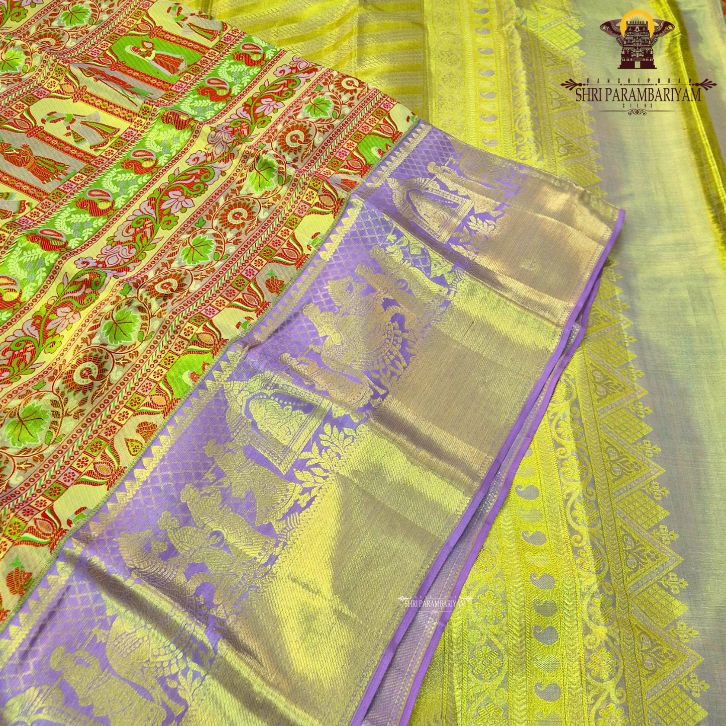 A charming lavender / lilac base paired with a rich golden zari pallu Saree