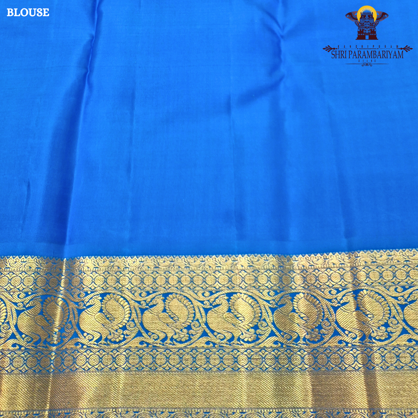 Deep Rani Pink / Maroonish Pink body with Royal Blue border and Green edge Saree