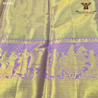 A charming lavender / lilac base paired with a rich golden zari pallu Saree
