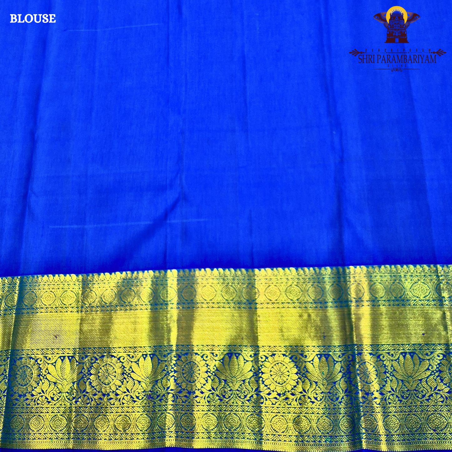 A rich Peacock Blue (teal blue tone) with Royal Blue and Gold zari border Saree