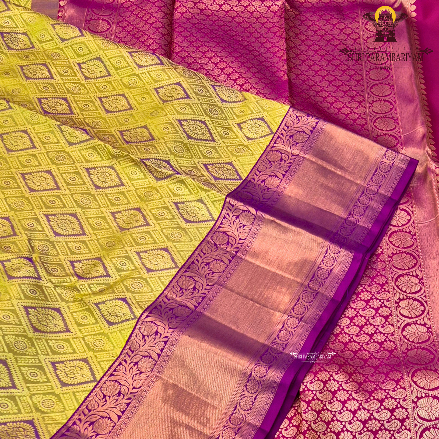 A mustard gold with a rich magenta purple korvai border and rose gold zari Saree
