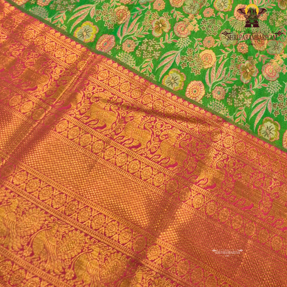 A vibrant rani pink tissue body paired with a contrasting parrot green border Saree