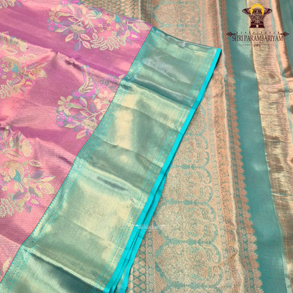 A graceful combination of rose pink body with a contrasting aqua green Saree
