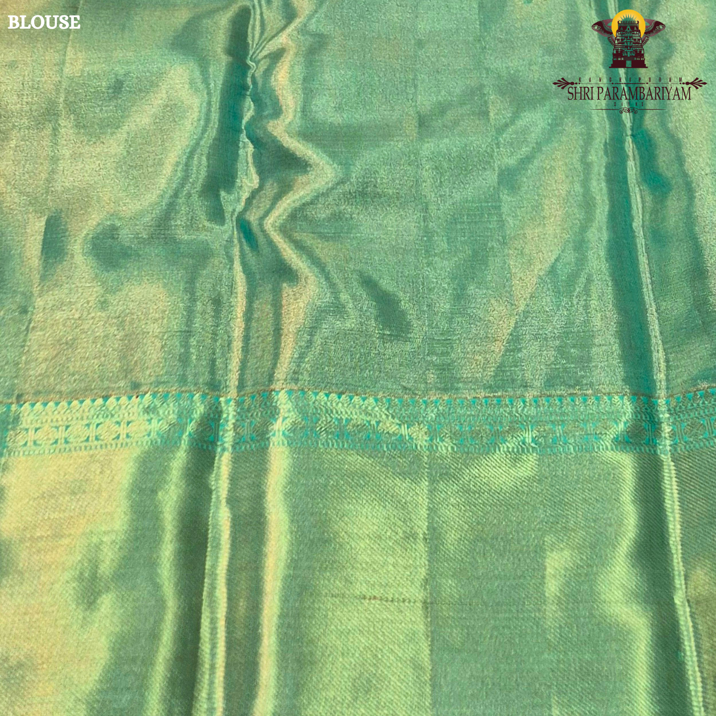 A graceful combination of rose pink body with a contrasting aqua green Saree