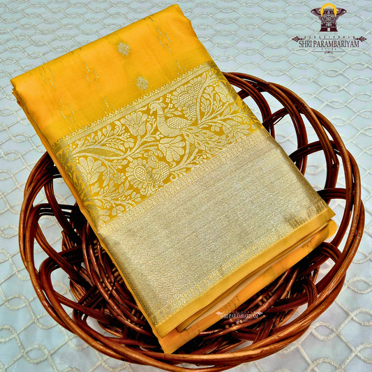 Rich mustard yellow / golden yellow with elegant silver zari Saree