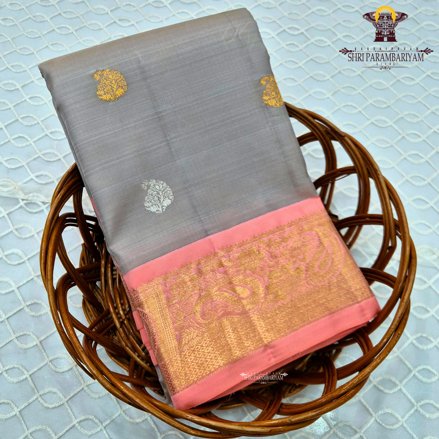 A sophisticated ash grey body beautifully decorated with elegant Saree