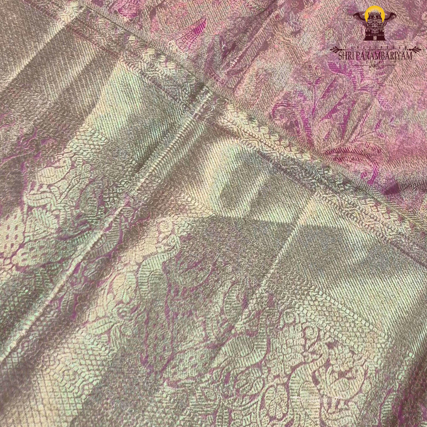 A graceful rose pink shade blended with antique gold tissue weaving Saree