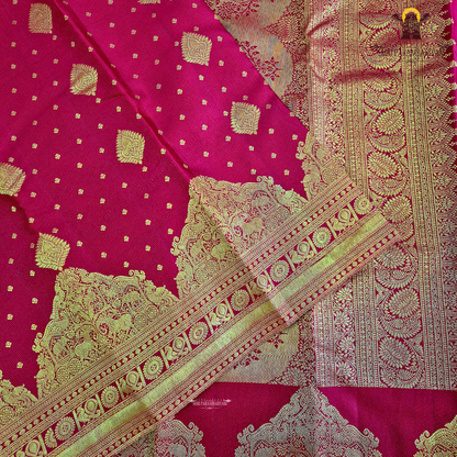 A rich Tomato Red / Vermilion Red body with elegant Golden Zari Saree