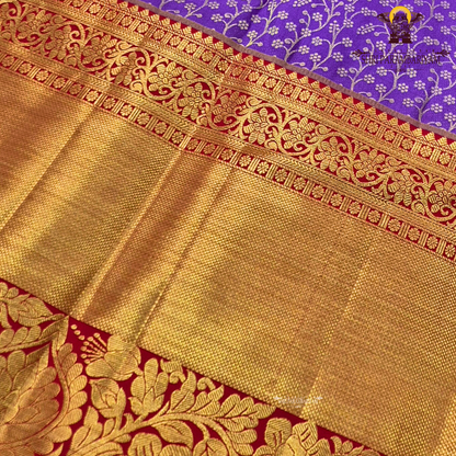 Vibrant royal purple (violet) with Contrast bright red border with heavy gold zari Saree