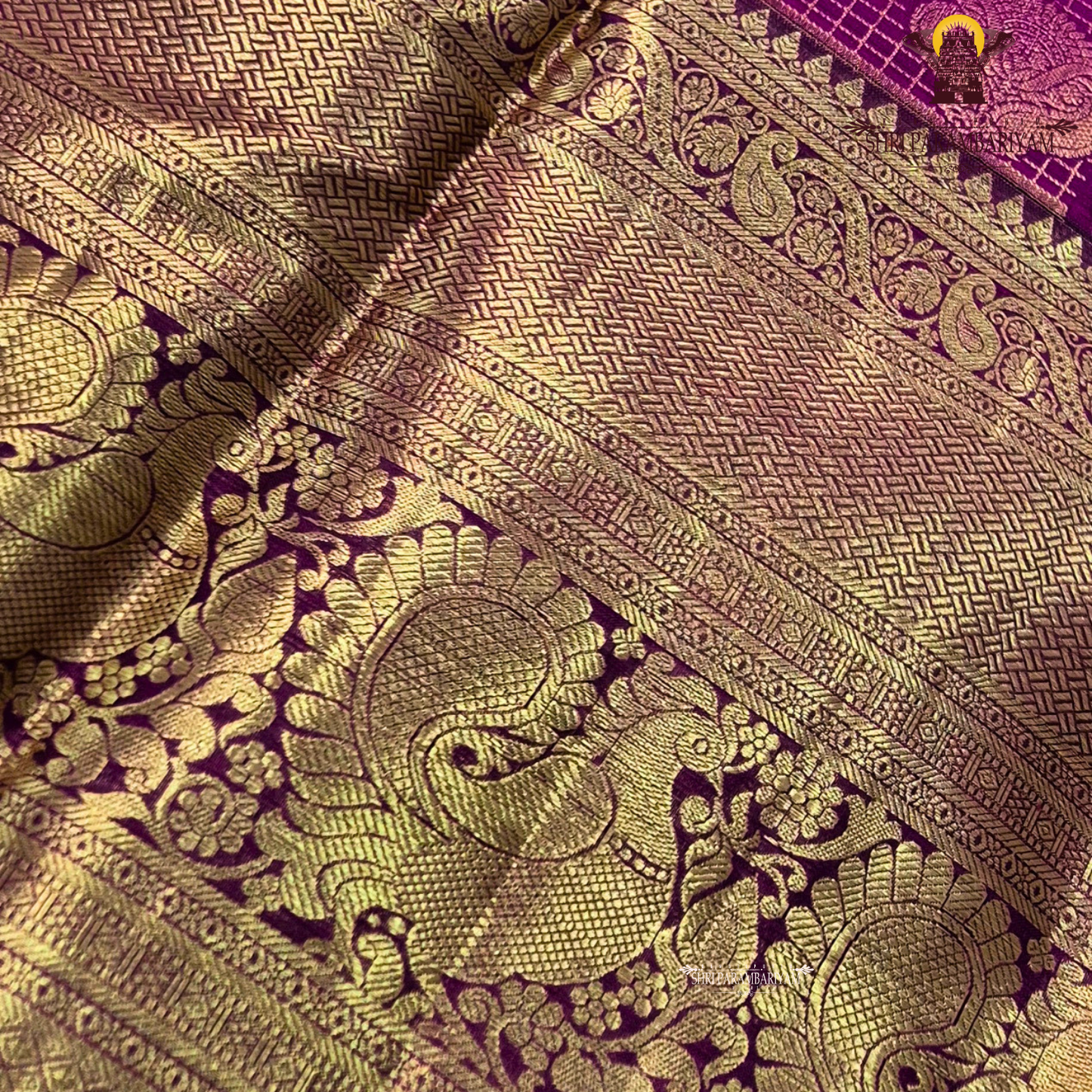 A luxurious antique gold body with a rich deep magenta / rani pink Saree