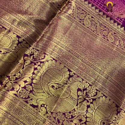 A luxurious antique gold body with a rich deep magenta / rani pink Saree