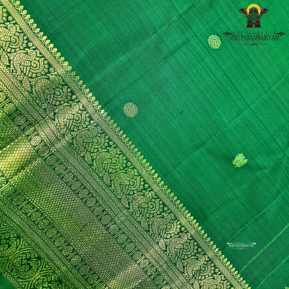 A rich emerald green Saree