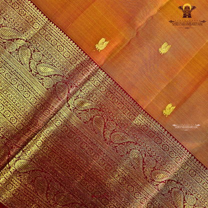 A golden Orange / Mango Orange with Rich Red and Gold Zari Border Saree