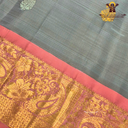 A sophisticated ash grey body beautifully decorated with elegant Saree
