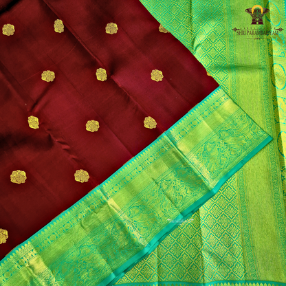 A rich Wine Magenta / Deep Rani Pink body with a contrasting Turquoise Blue Korvai Border Saree