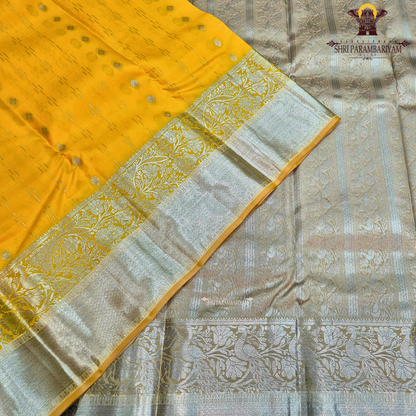 Rich mustard yellow / golden yellow with elegant silver zari Saree