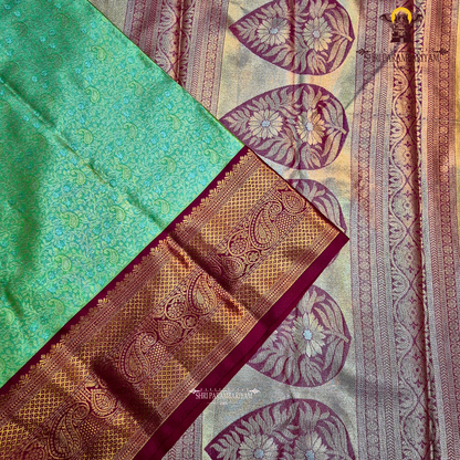 A graceful lime green / pista green Tissue Saree
