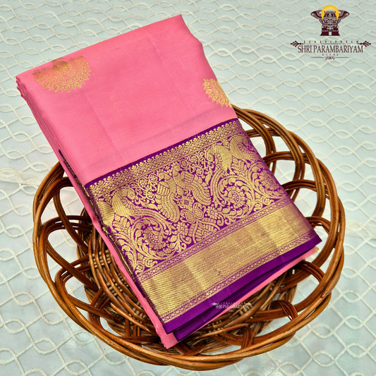 A delicate baby pink body adorned with elegant Saree