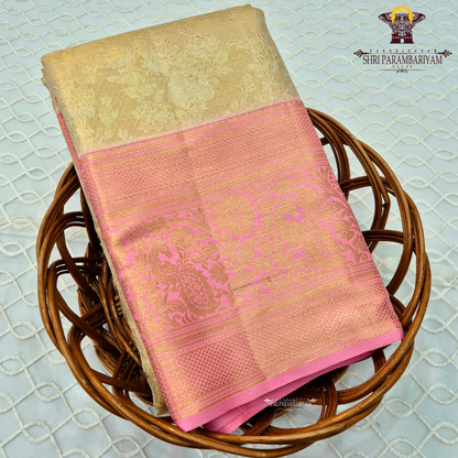 Champagne gold with pastel baby pink and rich golden zari Saree