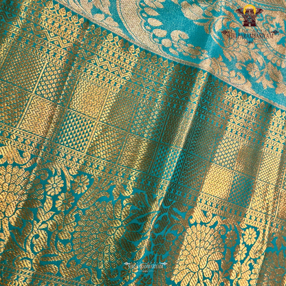 A soft dusty rose / blush pink Tissue Saree