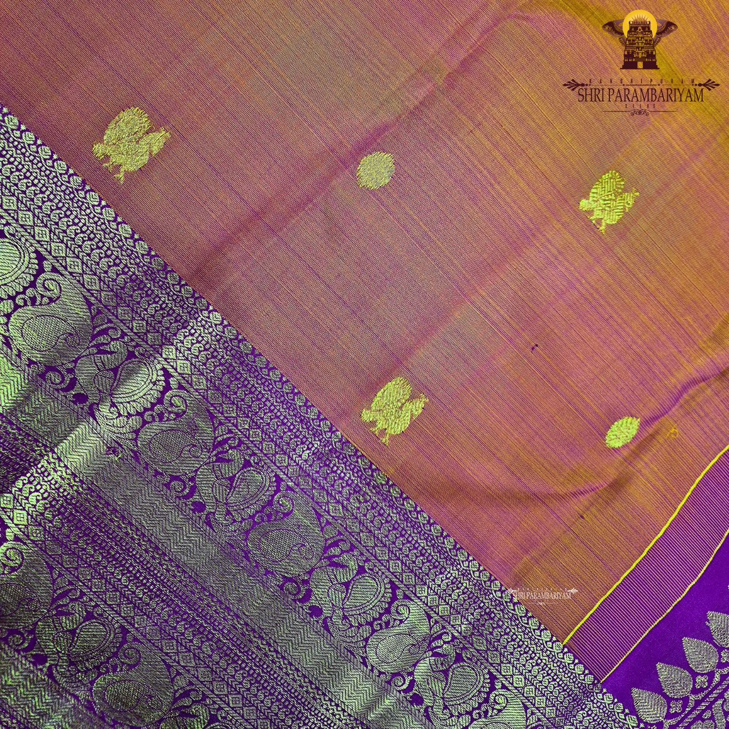 A vibrant orange with a rich gold zari border and a contrasting rani pink (magenta) edging Saree