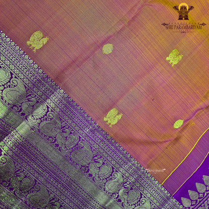 A vibrant orange with a rich gold zari border and a contrasting rani pink (magenta) edging Saree