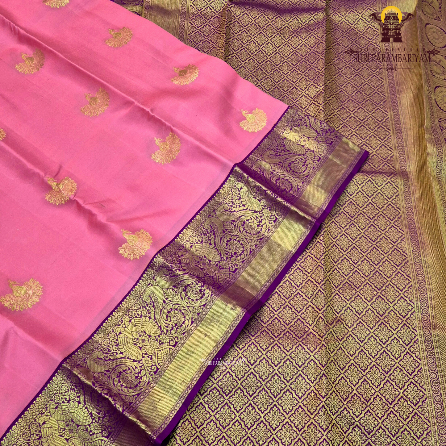 A delicate baby pink body adorned with elegant Saree