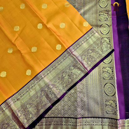 A radiant burnt orange body adorned with subtle gold zari Saree