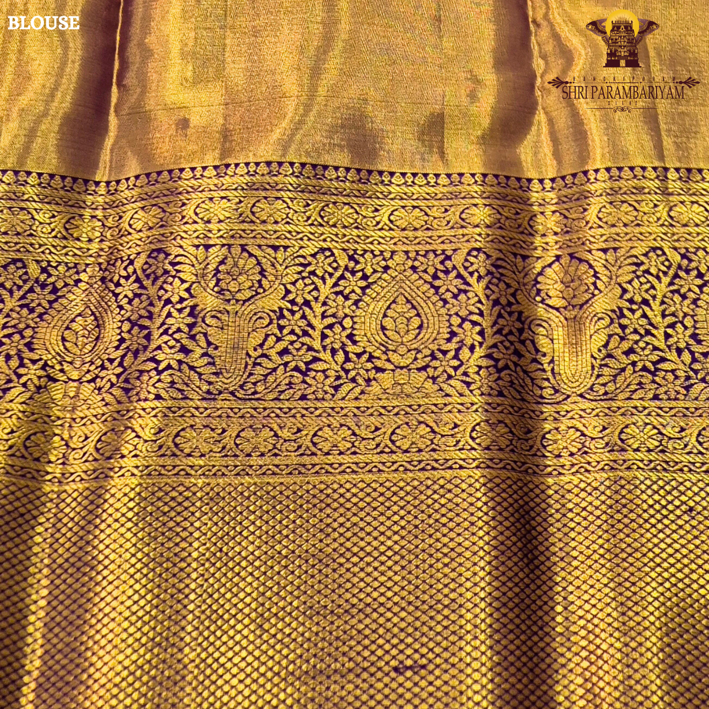 A rich combination of peachy orange body paired with a striking royal purple border Saree