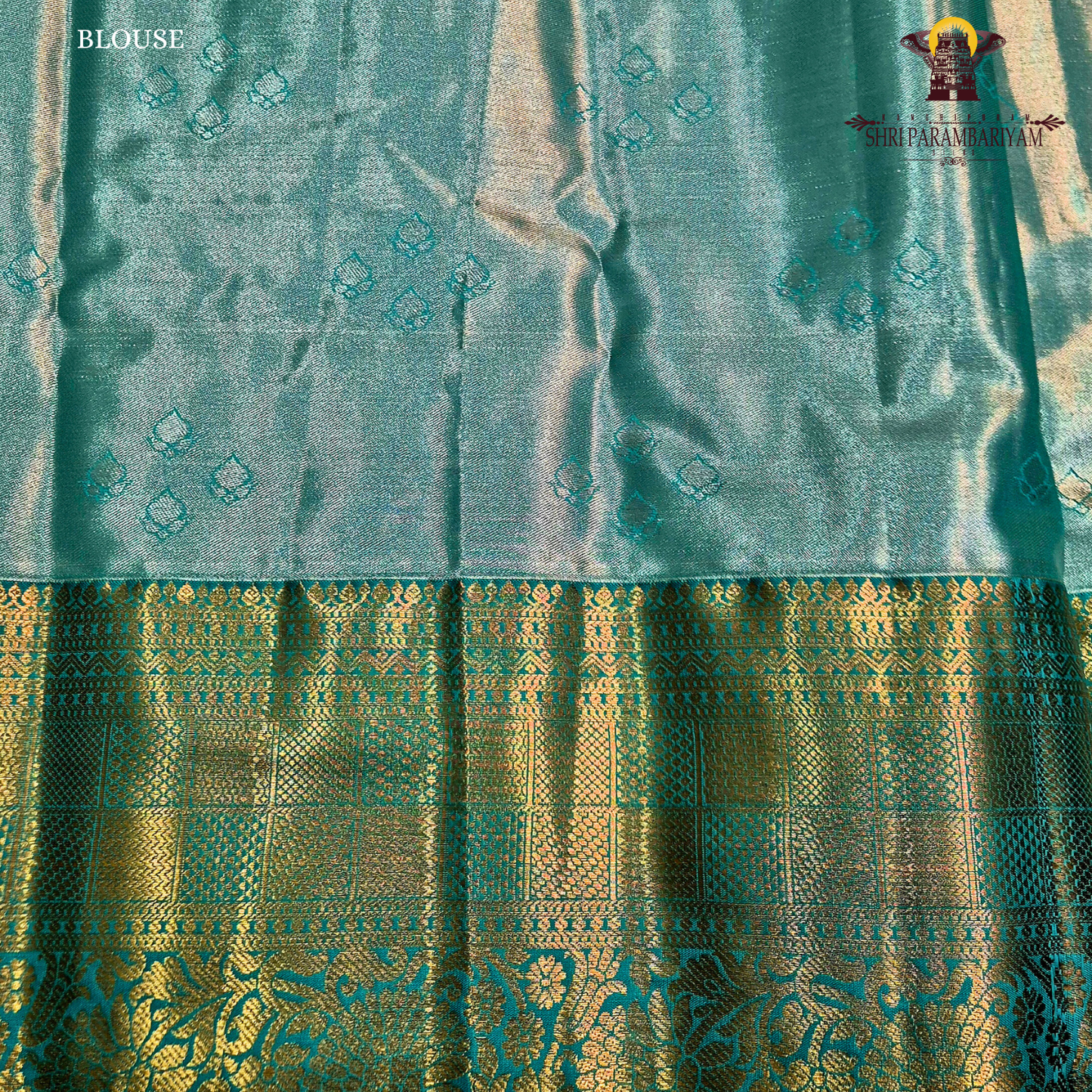 A soft dusty rose / blush pink Tissue Saree