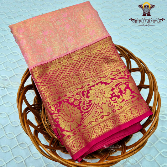 Peach pink with deep rani pink and rich golden zari Saree