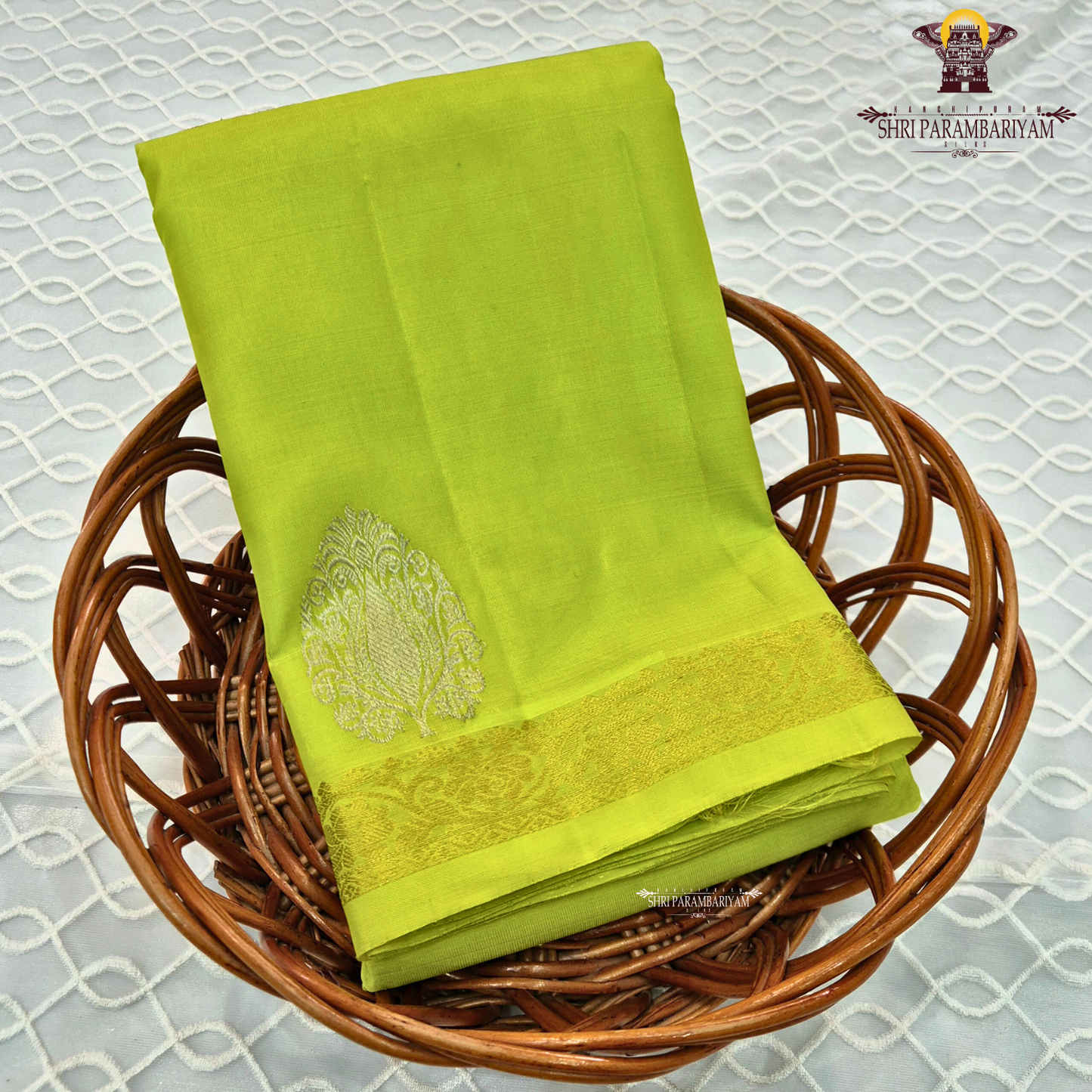 Bright parrot green (leaf green) shade with a subtle sheen Saree
