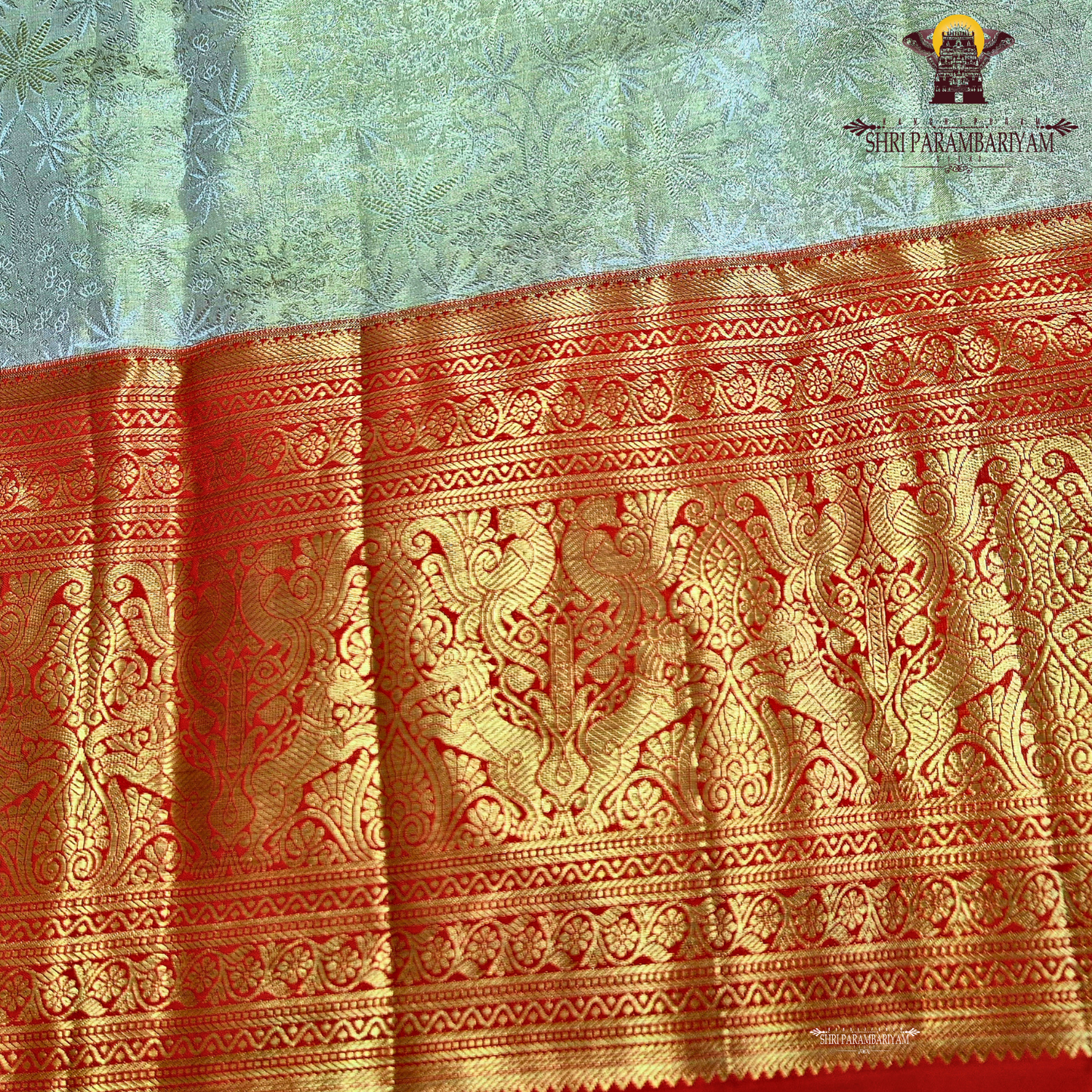 Elegant mint green / pastel pista green (Half White) with a soft golden tissue shine Saree