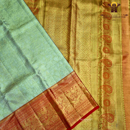 Elegant mint green / pastel pista green (Half White) with a soft golden tissue shine Saree