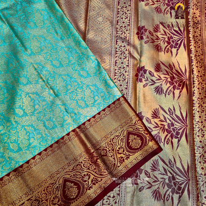 A rich sea green / aqua green Tissue Saree