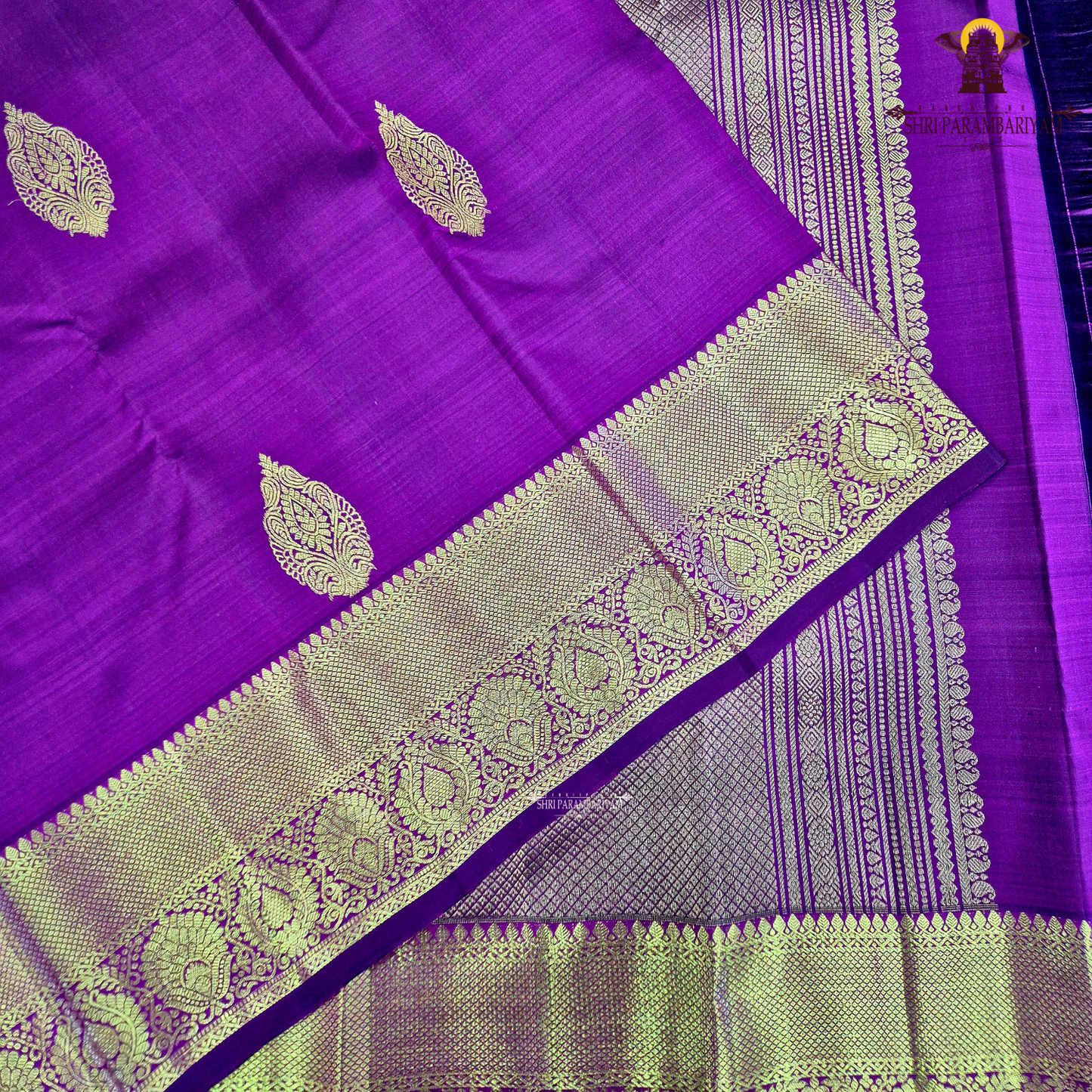 A elegant Magenta Purple / Dark Rani Pink with a rich silk sheen Saree