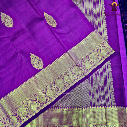 A elegant Magenta Purple / Dark Rani Pink with a rich silk sheen Saree