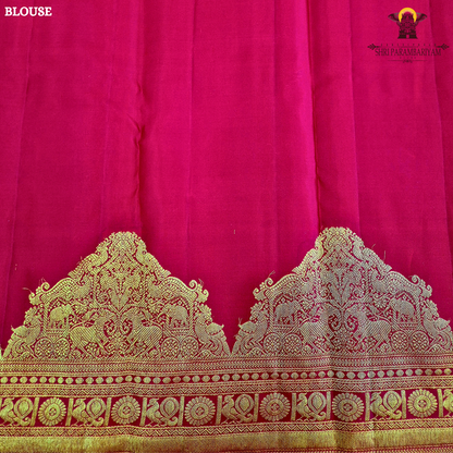 A rich Tomato Red / Vermilion Red body with elegant Golden Zari Saree