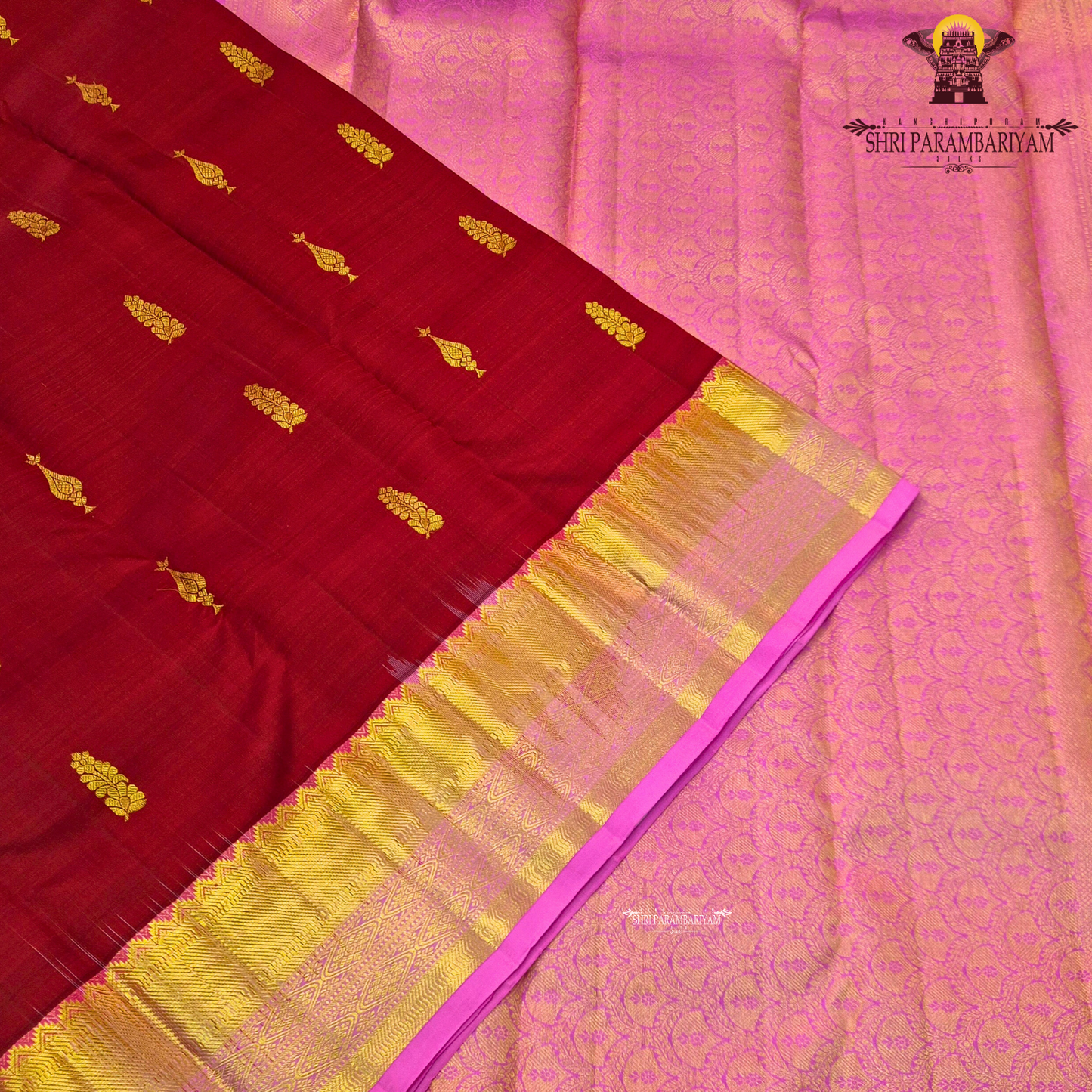 Elegant Deep Maroon body with a rich Pink border and pallu Saree