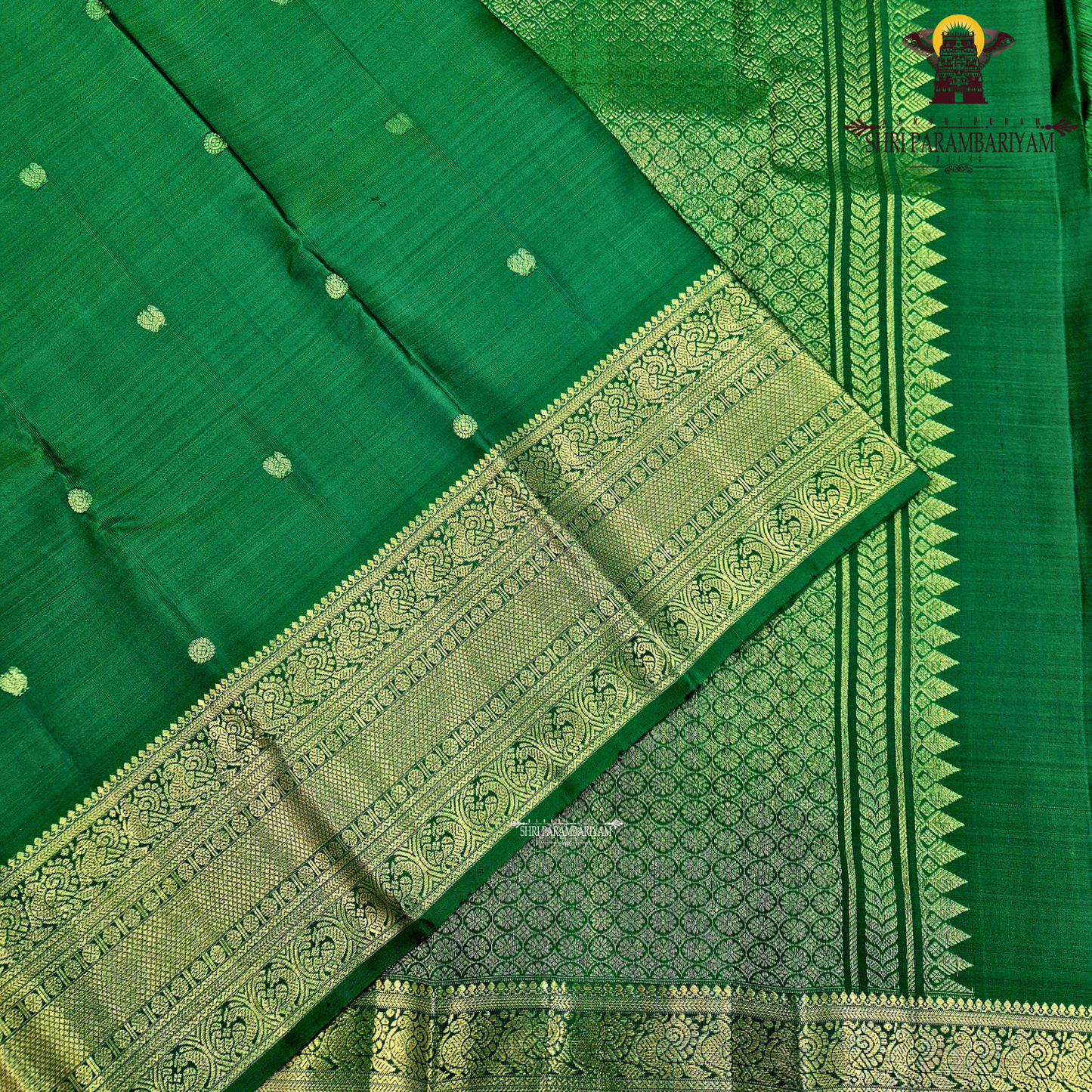 A rich emerald green Saree