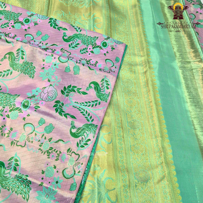 Soft pastel lavender-pink base with contrasting Saree