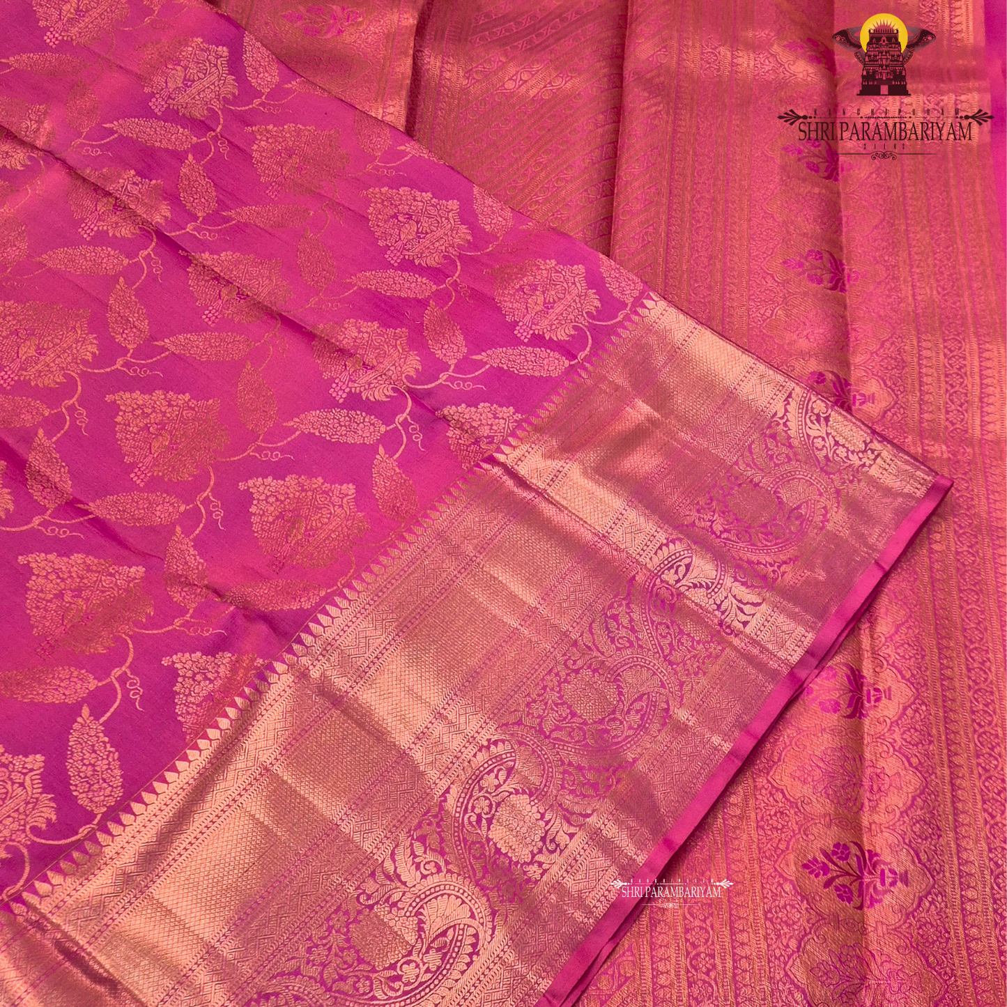A bright and rich deep pink (rani pink) with radiant gold zari work Saree