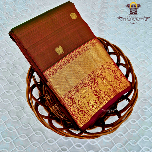 A rich copper brown dual shade color with a subtle maroon undertone Saree