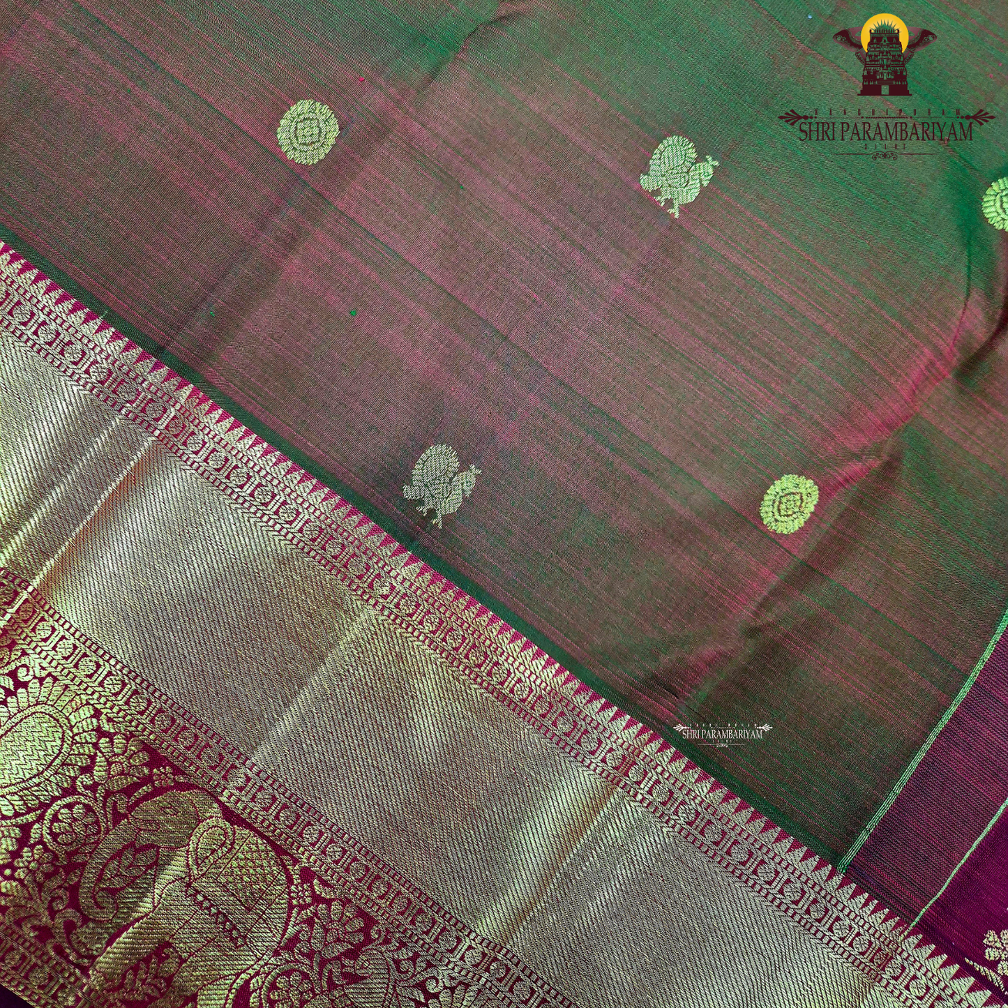 A rich copper brown dual shade color with a subtle maroon undertone Saree