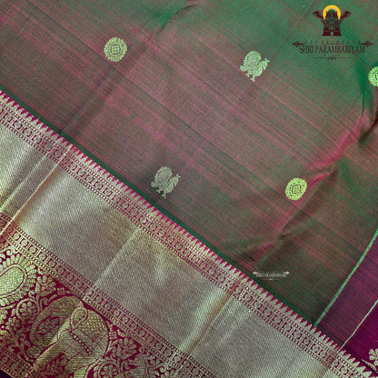 A rich copper brown dual shade color with a subtle maroon undertone Saree
