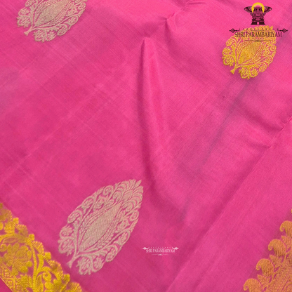 Vibrant rani pink shade that exudes elegance Saree