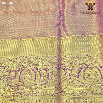 Rich antique gold with deep magenta / purple accents Saree