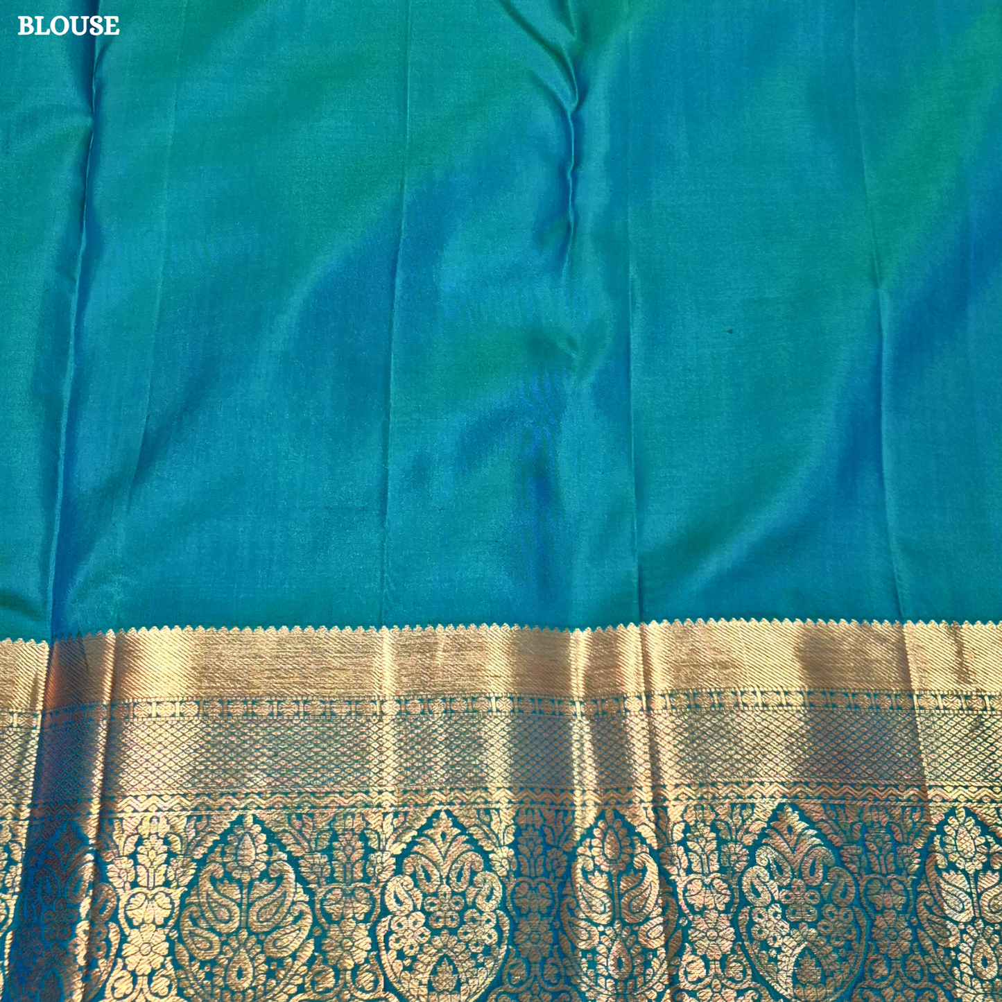 A soft pastel sky blue body, complemented by a contrasting teal blue korvai border Saree